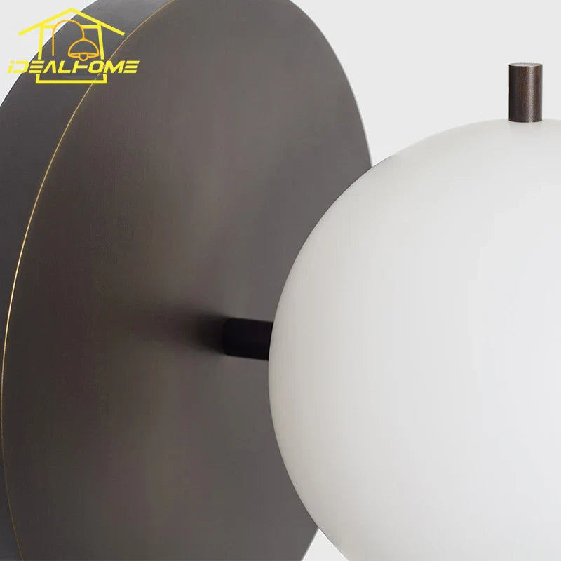 DecorBites™ Black/Gold Ball Wall Lamp - Minimalist Iron Art Decor for Bedroom & Cafe