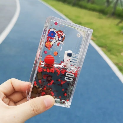 DecorBites™ Astronaut Drift Keychain: Creative Liquid Hourglass Stress Relief Toy & Home Decor