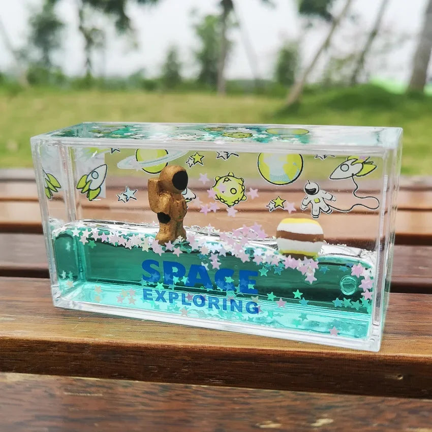 DecorBites™ Astronaut Drift Keychain: Creative Liquid Hourglass Stress Relief Toy & Home Decor