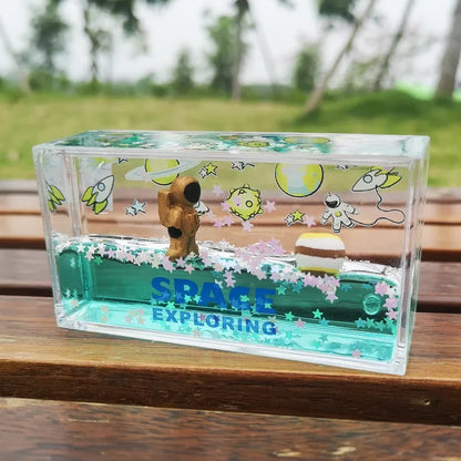 DecorBites™ Astronaut Drift Keychain: Creative Liquid Hourglass Stress Relief Toy & Home Decor