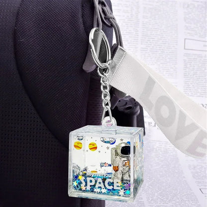 DecorBites™ Astronaut Drift Keychain: Creative Liquid Hourglass Stress Relief Toy & Home Decor