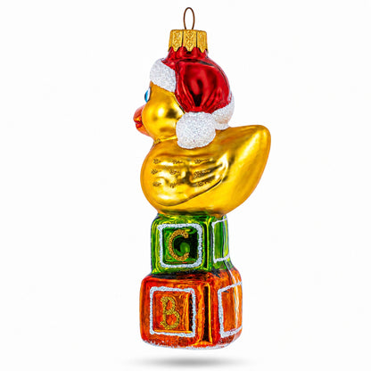 Yellow Duck in Santa Hat on Letter Blocks Glass Christmas Ornament