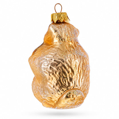 Otter Holding a Log Glass Christmas Ornament