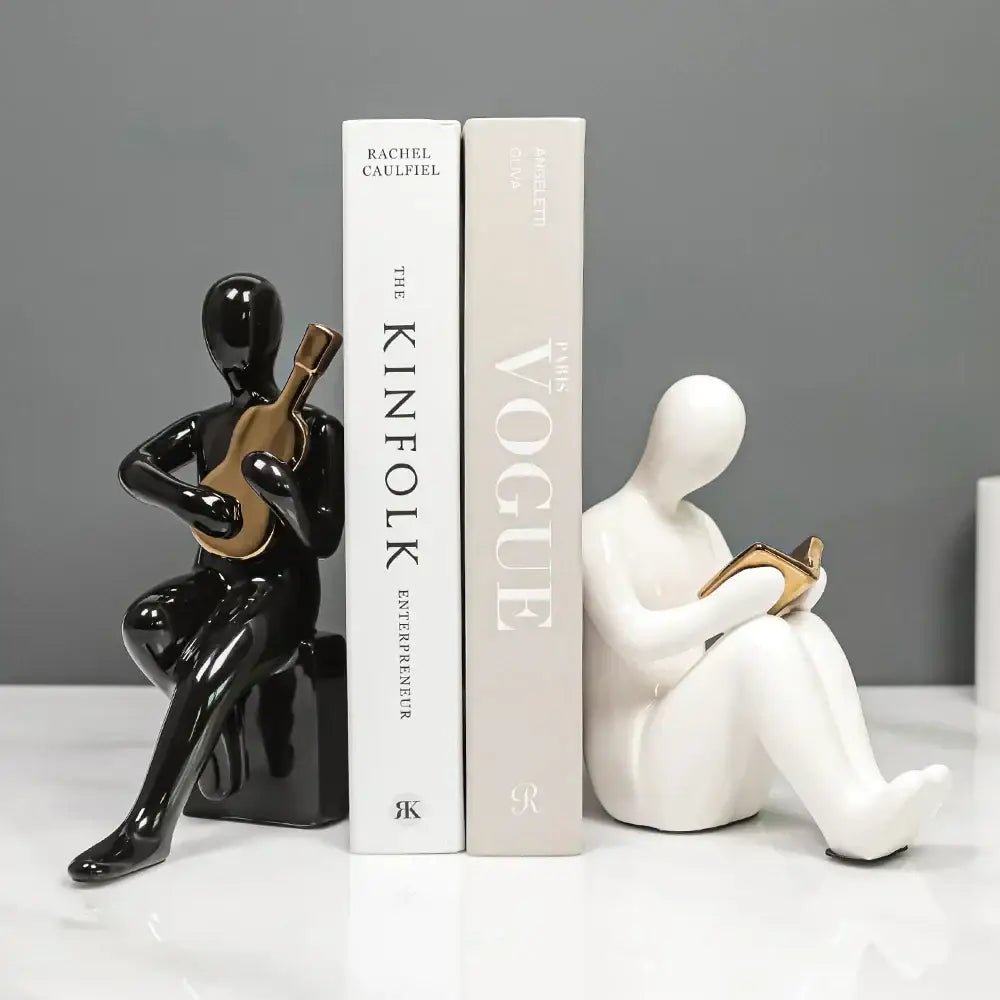 Abstract black and gold character bookends office guitar decor
