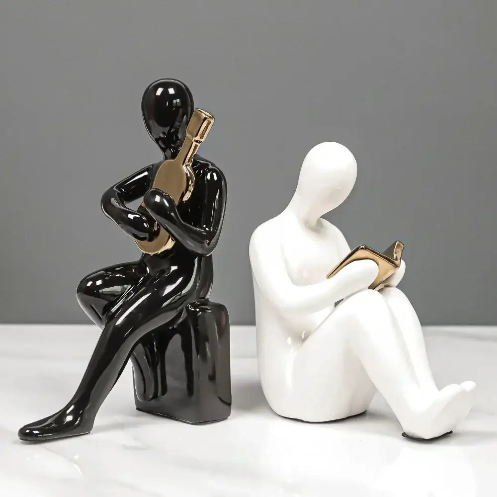 Abstract black and gold character bookends office guitar decor