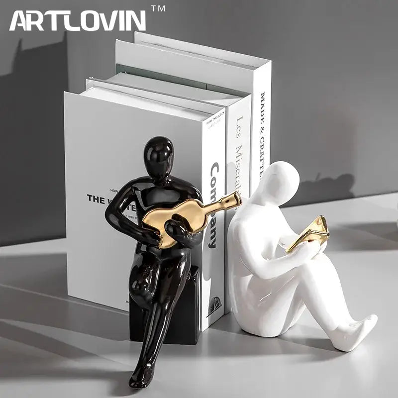 Abstract black and gold character bookends office guitar decor