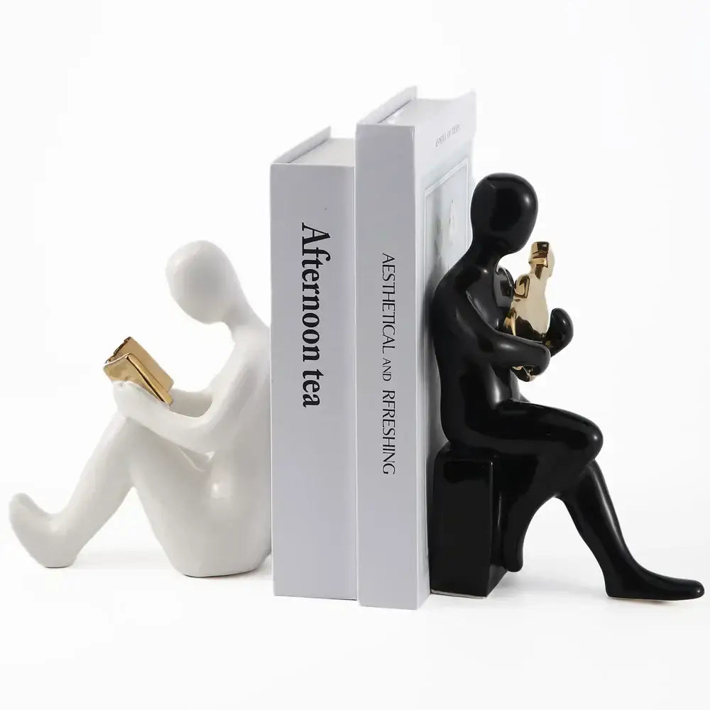 Abstract black and gold character bookends office guitar decor