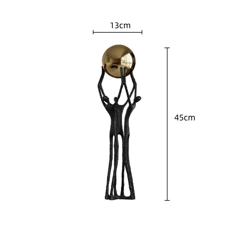 Abstract black and gold human figurine golden ball holder living room