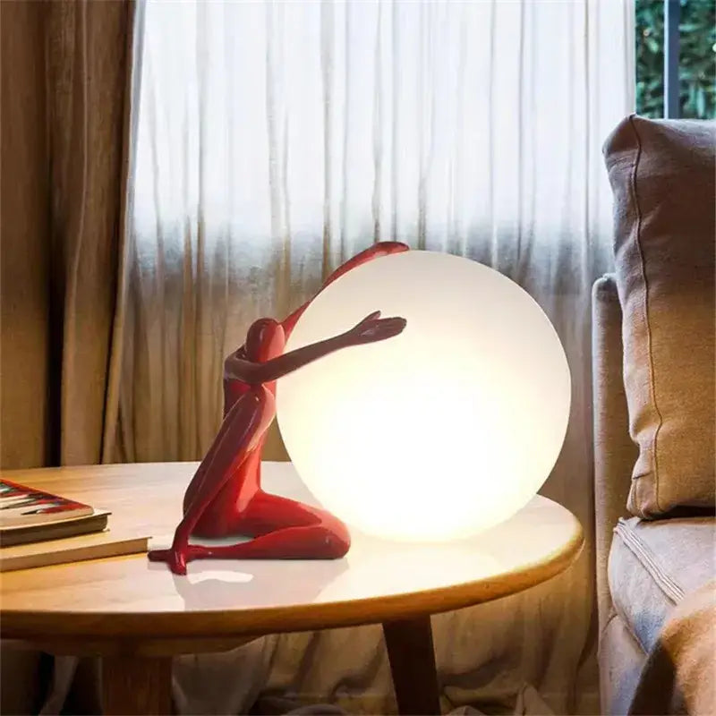 Abstract black & red ball holding character resins lamp living room