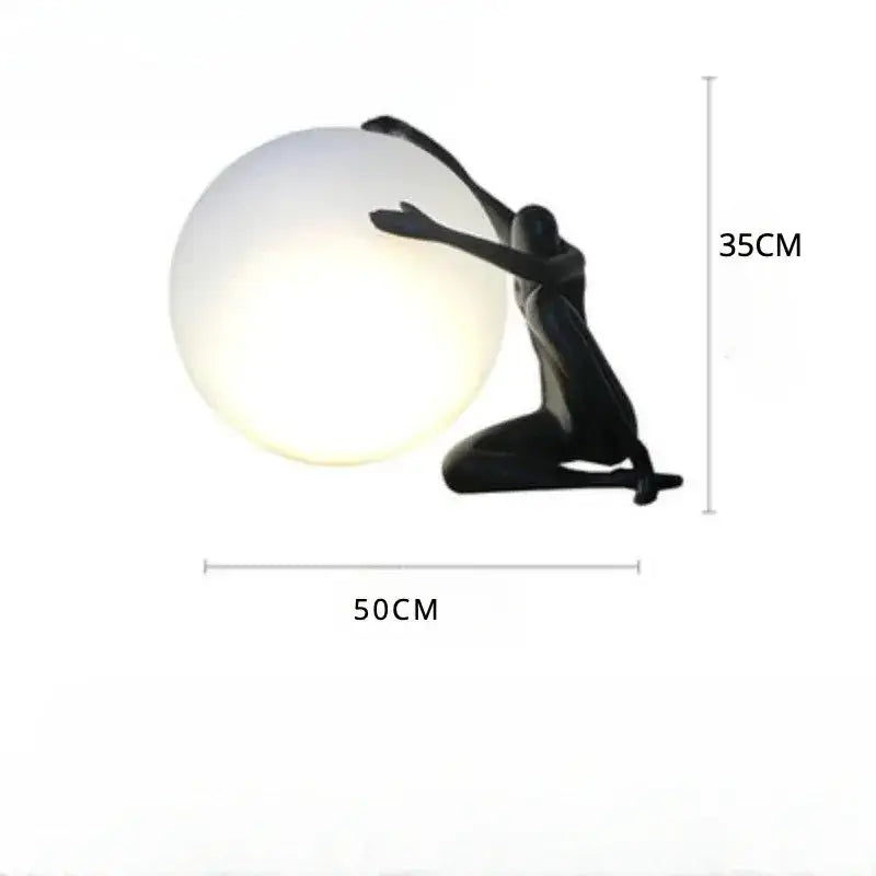 Abstract black & red ball holding character resins lamp living room