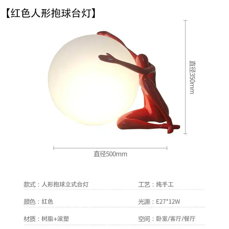 Abstract black & red ball holding character resins lamp living room