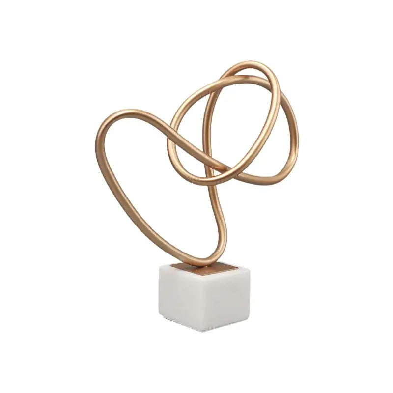 Abstract gold line geometric metal sculptures on marble living room decor