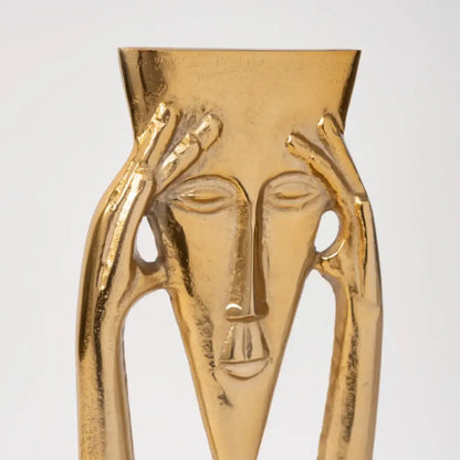 Abstract golden masked figure sculpture living room decor