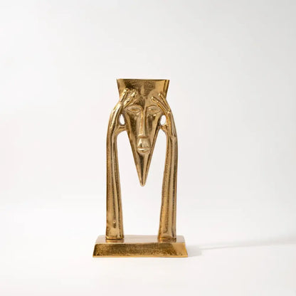 Abstract golden masked figure sculpture living room decor