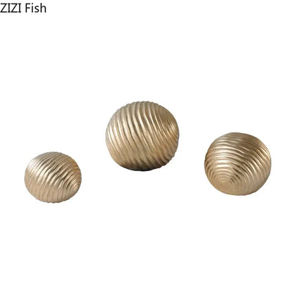 Abstract golden wave ball sculpture living room ribbed metal decor
