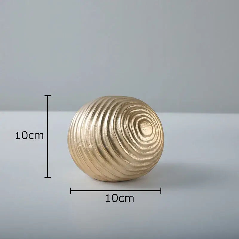 Abstract golden wave ball sculpture living room ribbed metal decor