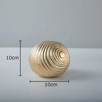 Abstract golden wave ball sculpture living room ribbed metal decor