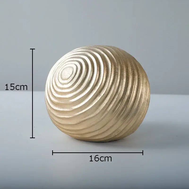 Abstract golden wave ball sculpture living room ribbed metal decor
