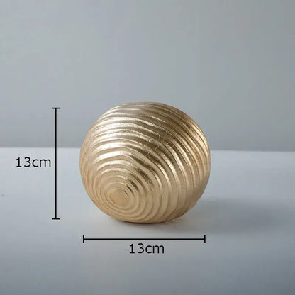 Abstract golden wave ball sculpture living room ribbed metal decor