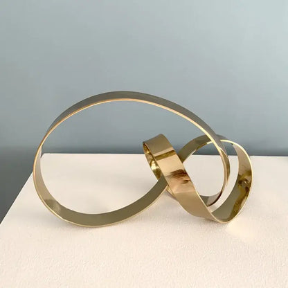 Abstract knot golden metal sculpture living room decor