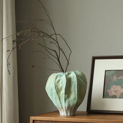 Abstract mint & olive ceramic vase with irregular folds living room