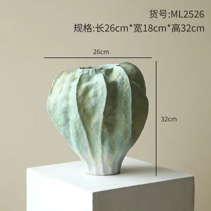 Abstract mint & olive ceramic vase with irregular folds living room
