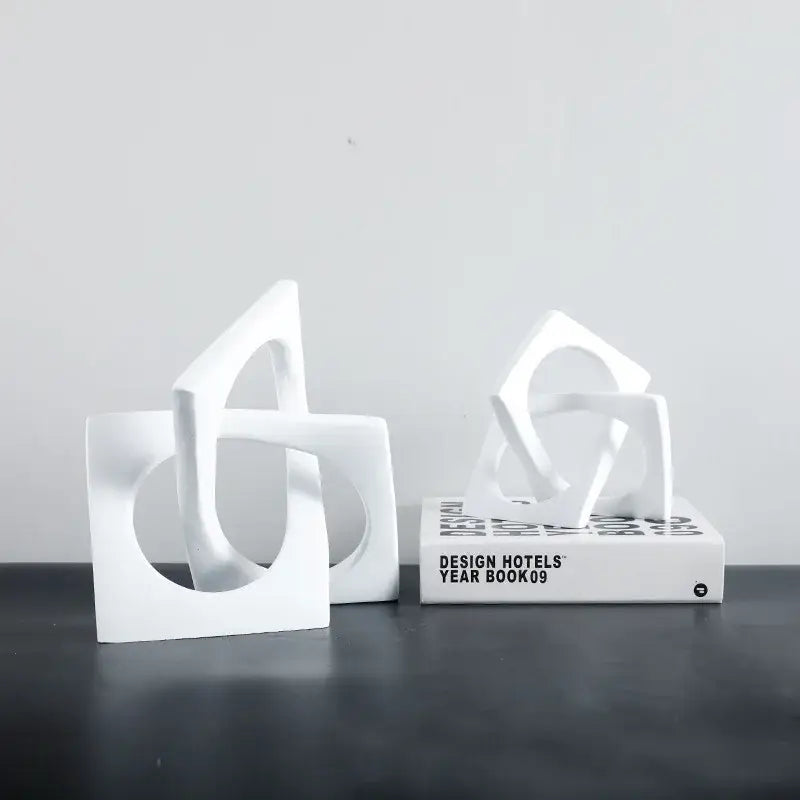 Abstract white ceramic geometric cross square ring bookends living room
