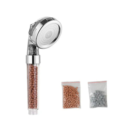 Adjustable shower head with chrome accents and filter beads bathroom