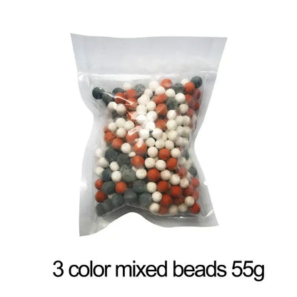 Adjustable shower head with chrome accents and filter beads bathroom