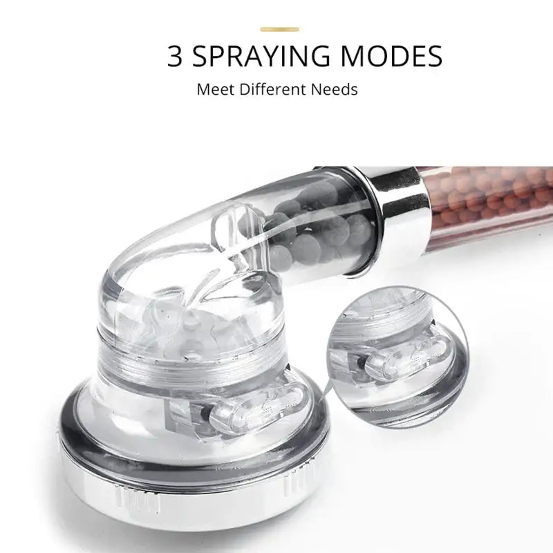 Adjustable shower head with chrome accents and filter beads bathroom
