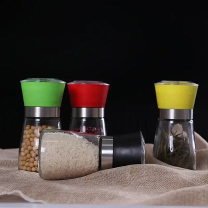 Adjustable spice grinder set with colorful silicone tops for kitchen