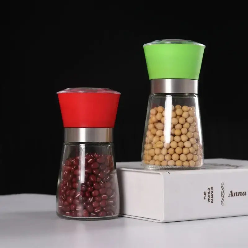Adjustable spice grinder set with colorful silicone tops for kitchen