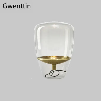 Amber glass and brass led table lamp for bedroom lighting