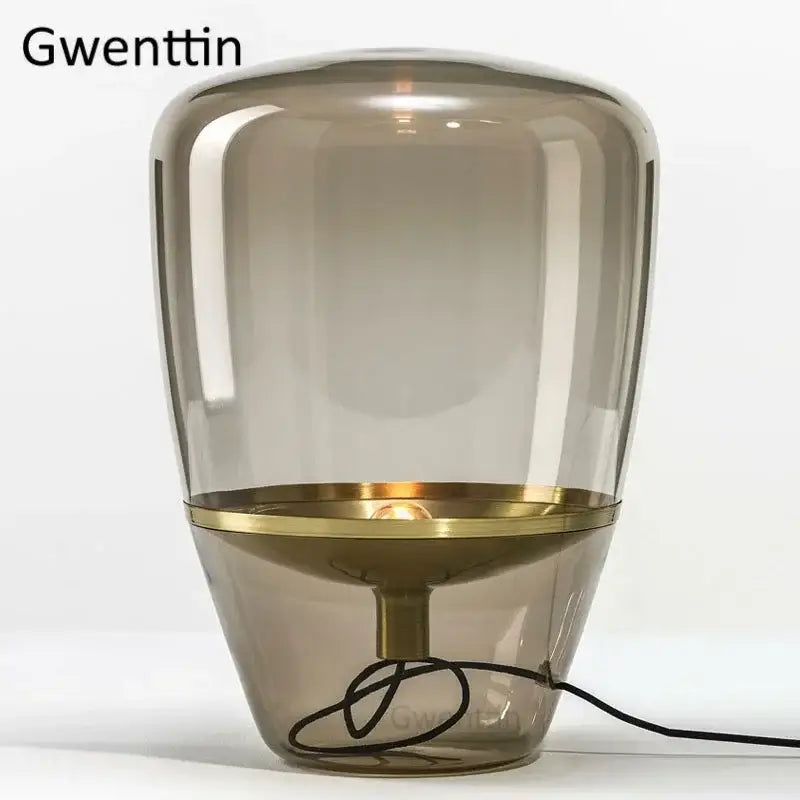 Amber glass and brass led table lamp for bedroom lighting