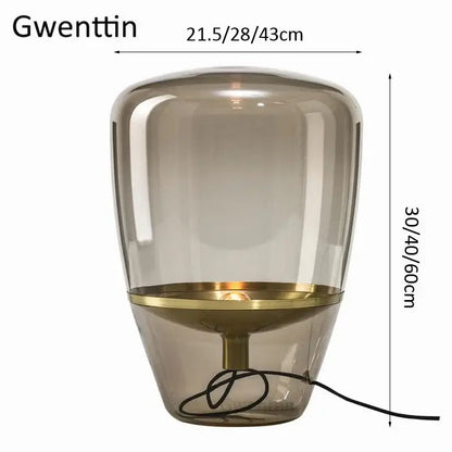 Amber glass and brass led table lamp for bedroom lighting