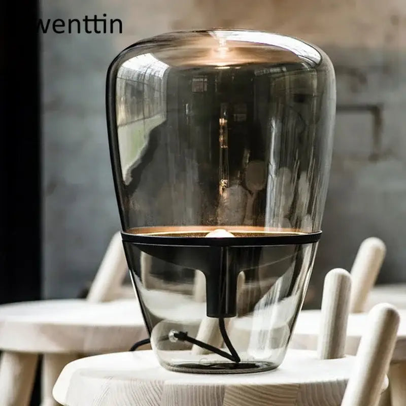 Amber glass and brass led table lamp for bedroom lighting
