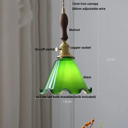 Amber glass pendant light with brass knob switch for dining room