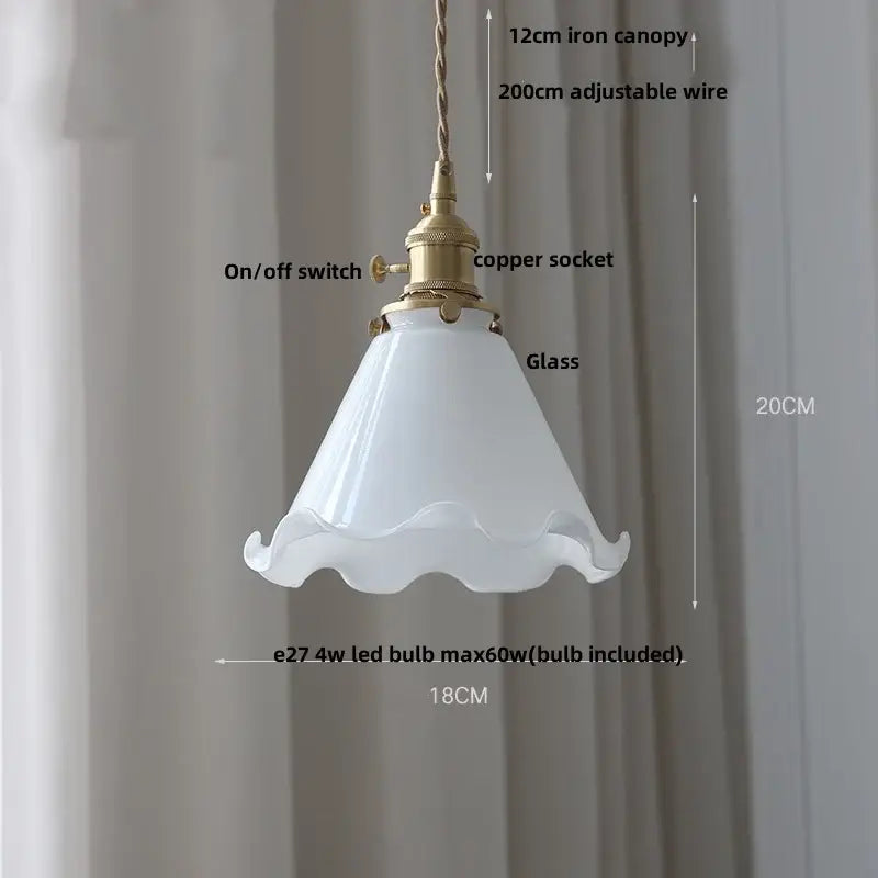 Amber glass pendant light with brass knob switch for dining room