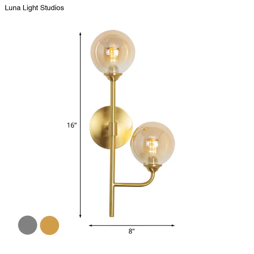 DecorBites™ Amber/Smoke Gray Glass 2-Head LED Wall Sconce - Sphere Bathroom Wall Mount Light with Brass Finish