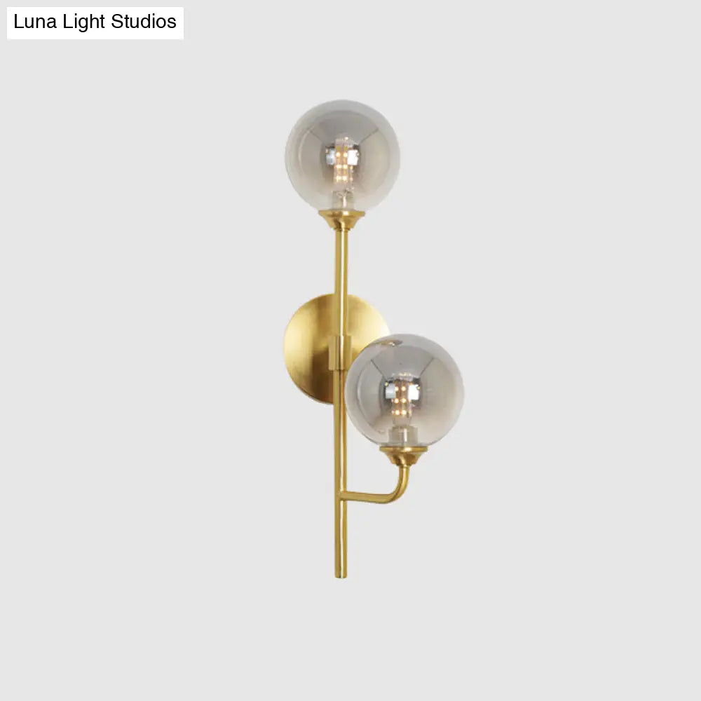 DecorBites™ Amber/Smoke Gray Glass 2-Head LED Wall Sconce - Sphere Bathroom Wall Mount Light with Brass Finish