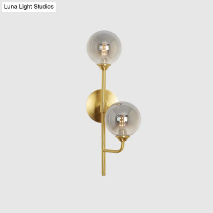 DecorBites™ Amber/Smoke Gray Glass 2-Head LED Wall Sconce - Sphere Bathroom Wall Mount Light with Brass Finish