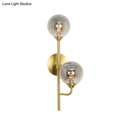 DecorBites™ Amber/Smoke Gray Glass 2-Head LED Wall Sconce - Sphere Bathroom Wall Mount Light with Brass Finish