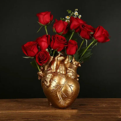 White anatomical heart vase with branches for living room decor