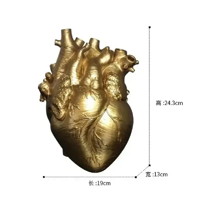 White anatomical heart vase with branches for living room decor