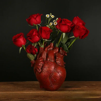 White anatomical heart vase with branches for living room decor