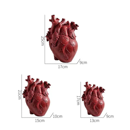 White anatomical heart vase with branches for living room decor