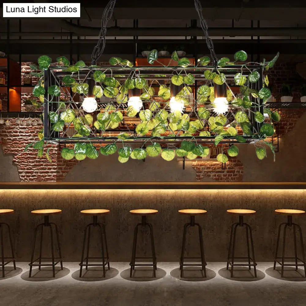 Antique black metal island pendant with greenery for kitchen dining
