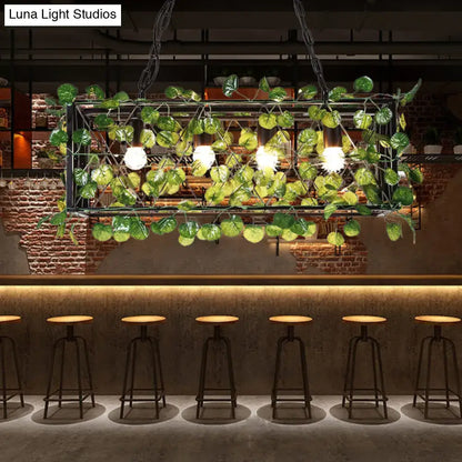 Antique black metal island pendant with greenery for kitchen dining