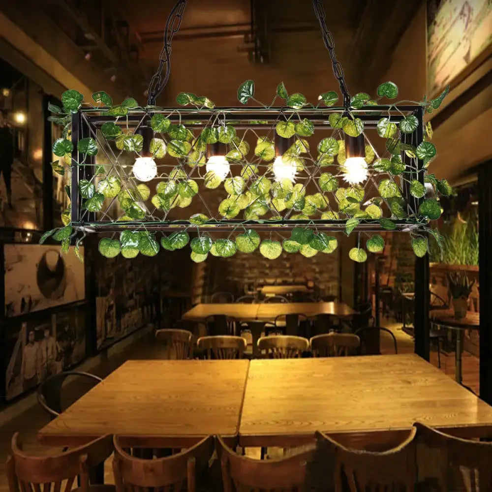 Antique black metal island pendant with greenery for kitchen dining