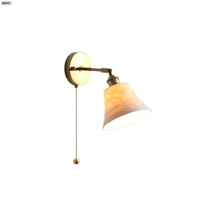 Antique brass and amber glass adjustable wall light bedroom sconce